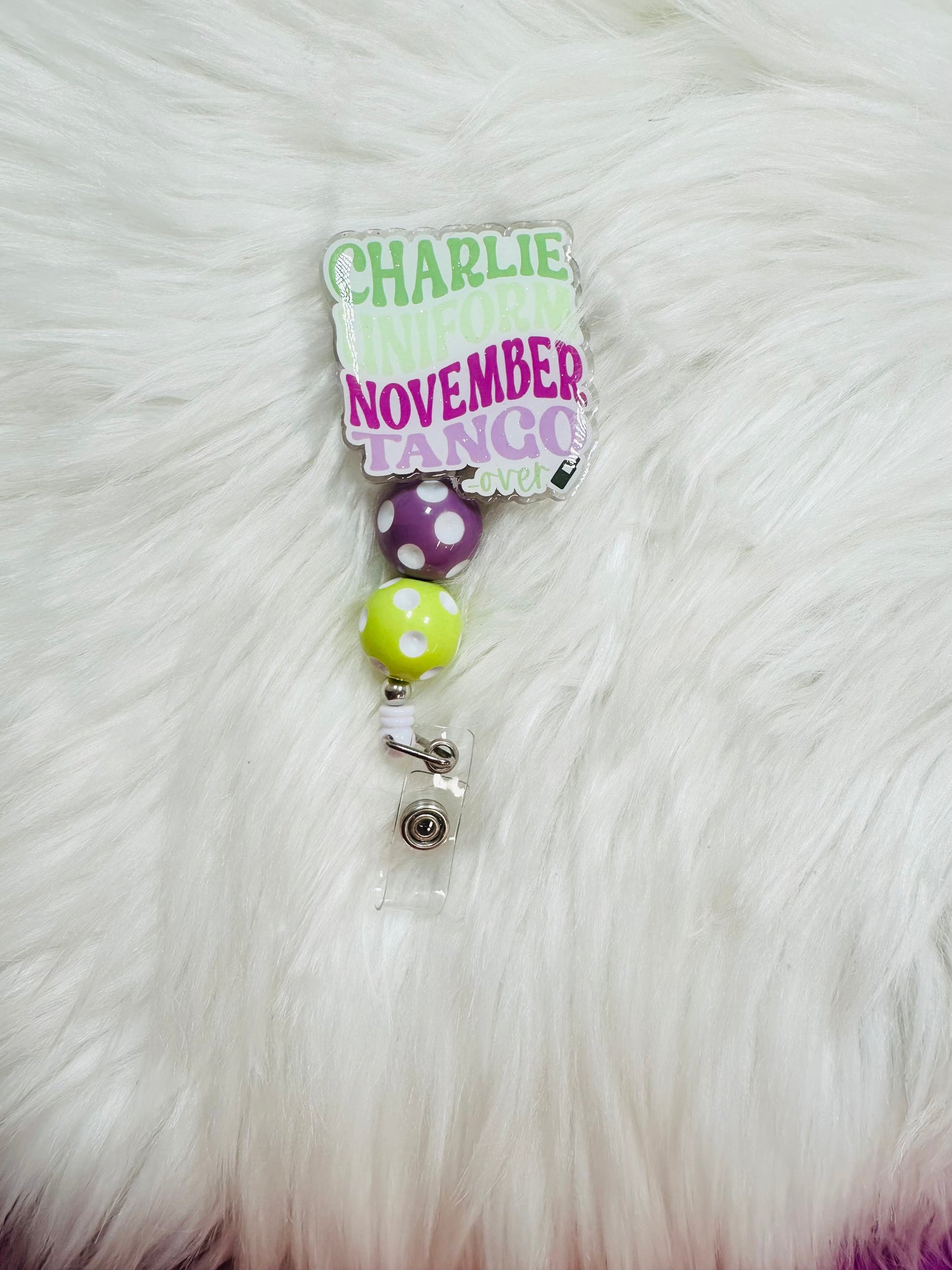 C*NT badge reel